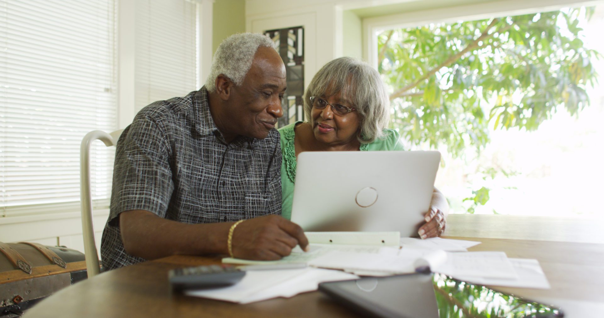 Senior black couple on the laptop computer Senior black couple on the laptop computer